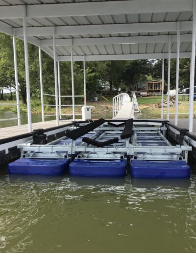 Boat lift mounted in an outdoor boat slip